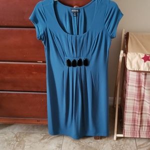 Green dress with black stone like pieces in front